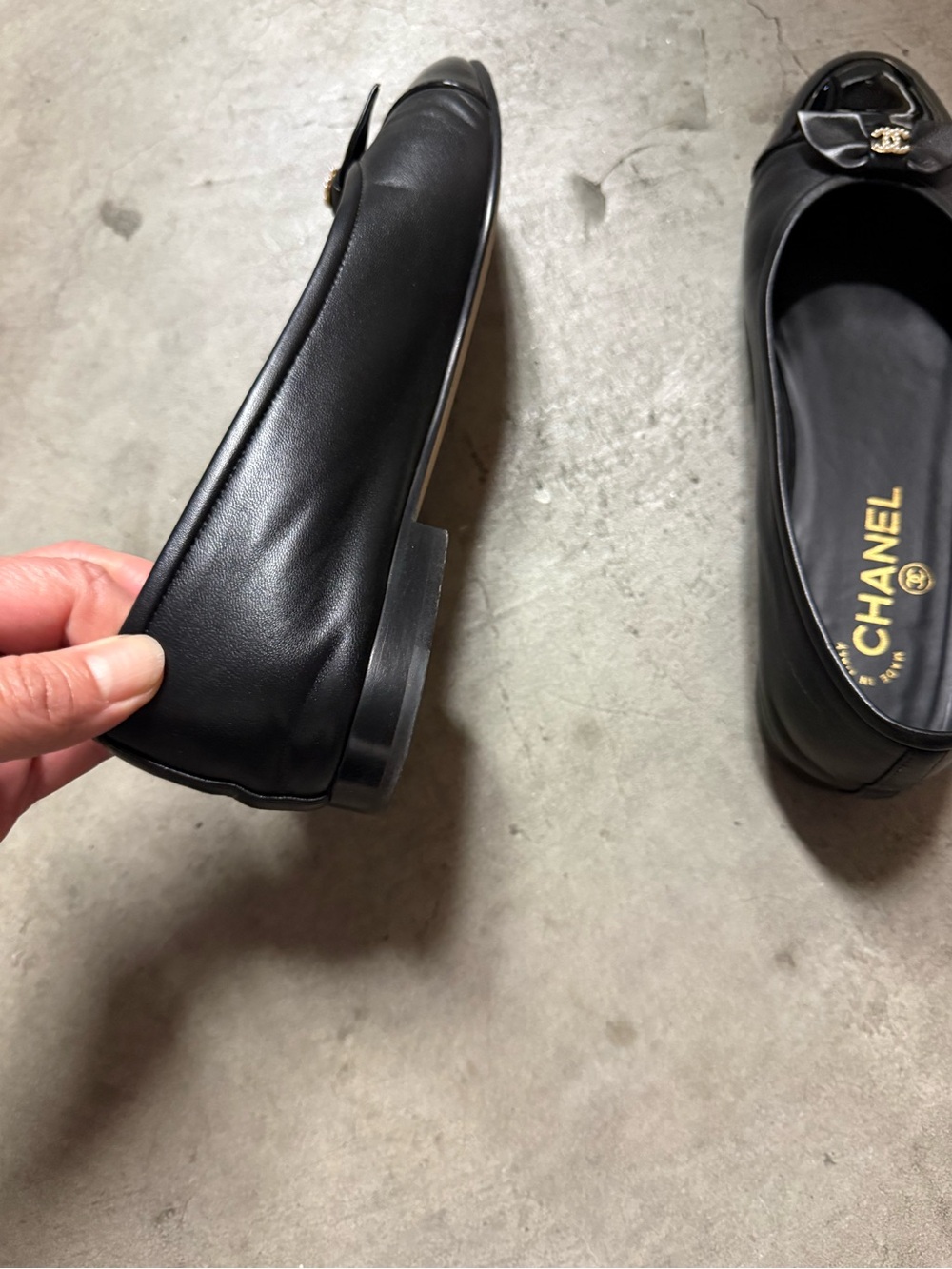 CHANEL Black Leather Ballet Flats with Patent Cap Toe and CC Charm - Picture 6 of 9